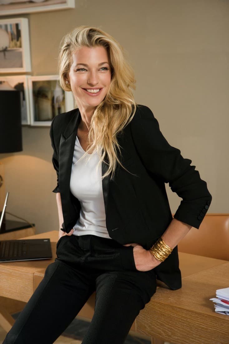 Nicole Junkermann at a desk, a relaxed portrait for the September note